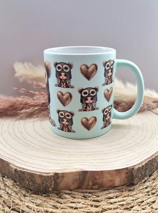 Tasse mit Eulenmotiv