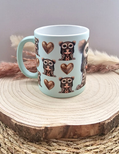 Tasse mit Eulenmotiv